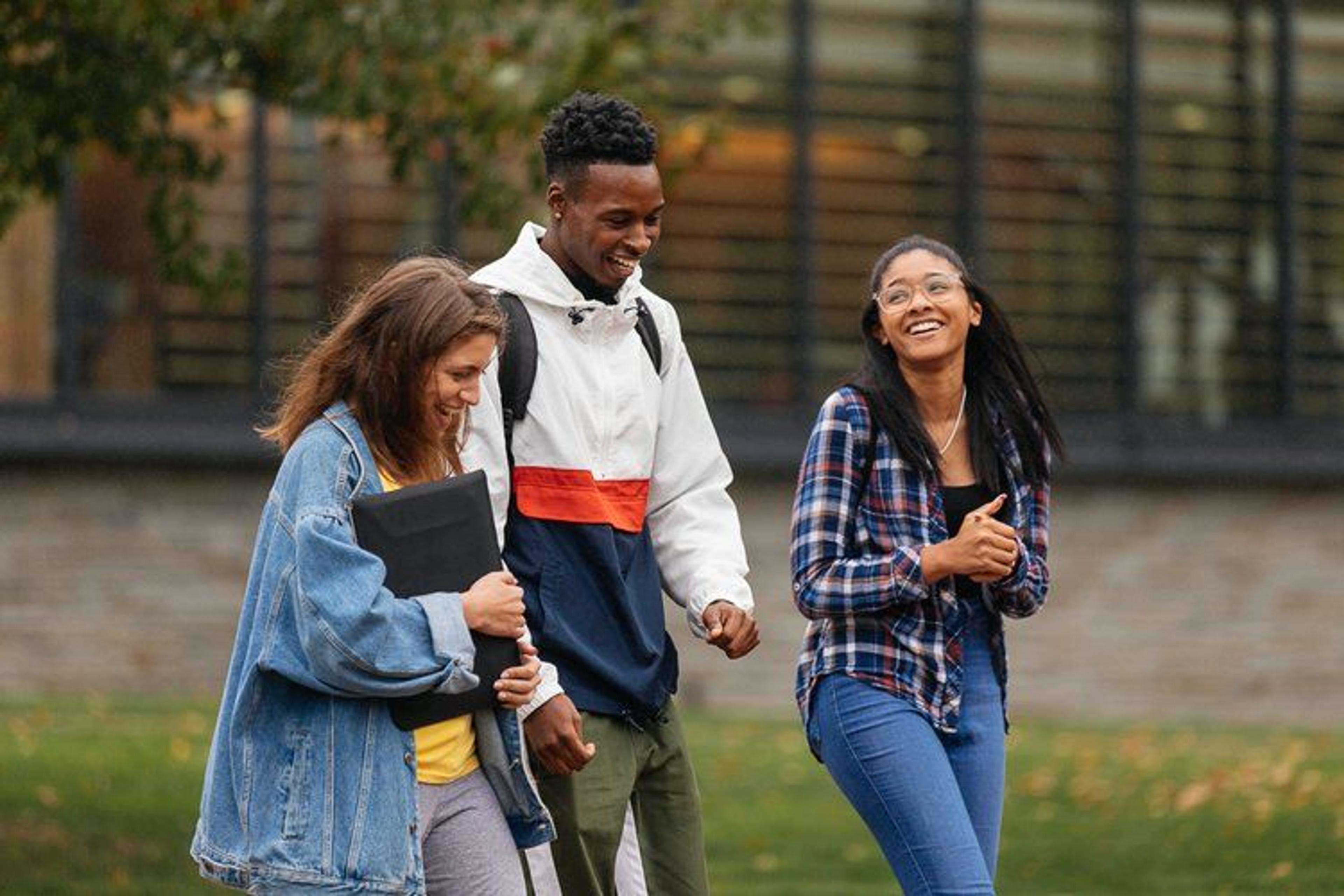 Image of students walking and talking