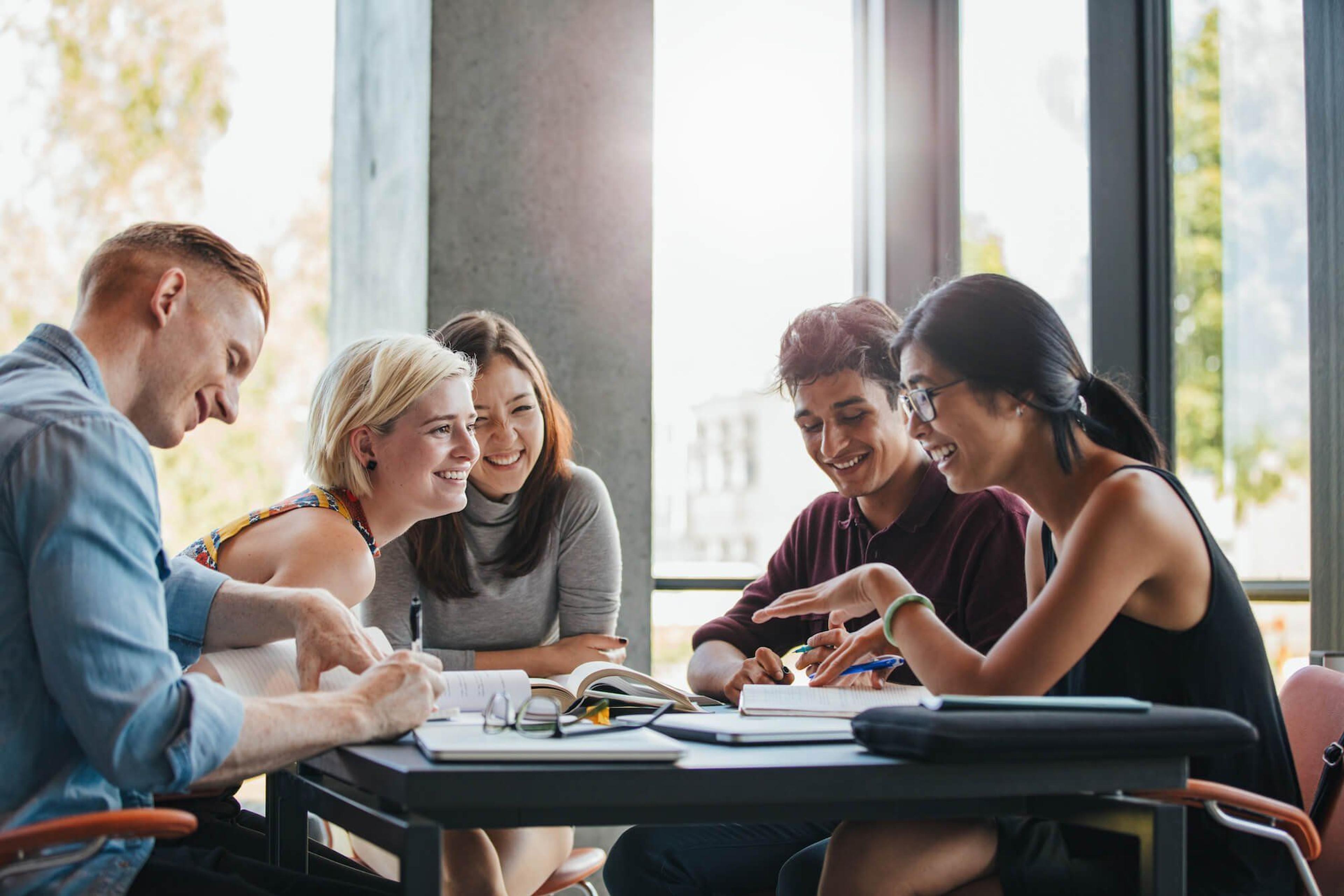 Image of students working together at a desk