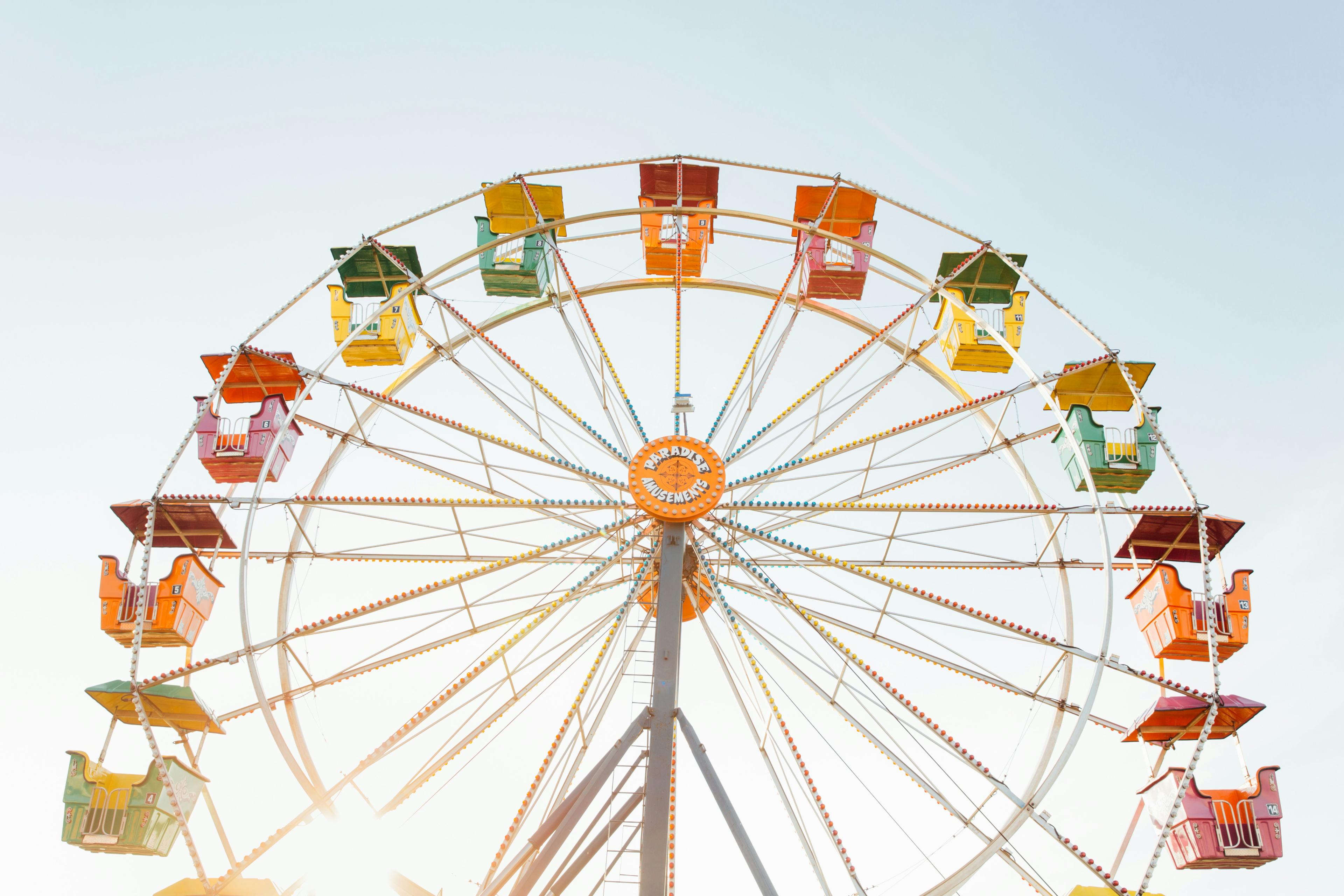 Ferris wheel in summer sunlight